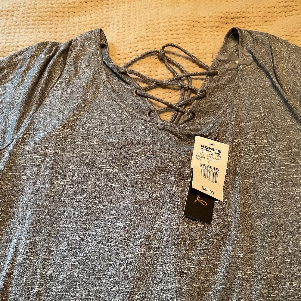 Grey heart and soul pull over with a tie back.